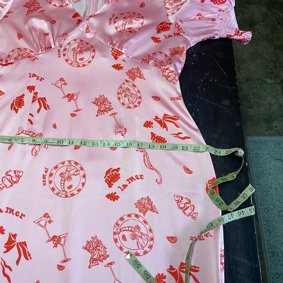 Never Fully Dressed
Pink La Mer May Midi Dress Size 14. - Picture 14 of 16